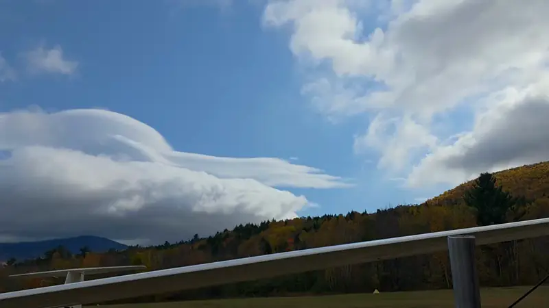 A timelapse of the sky closing over the ridge — the blue autumn sky giving way to a solid deck of cloud